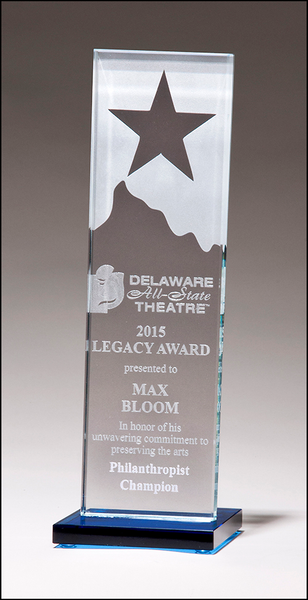 Glass award with star and mountain peak with blue glass base