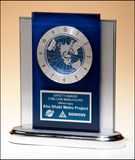 Blue and silver desk clock with world time clock movement