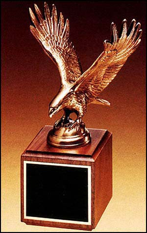 Fully modeled antique bronze eagle casting on a walnut base