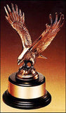 Fully modeled antique bronze eagle casting on a black wood base