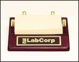 Post-it note holder with a rosewood stained piano finish base.