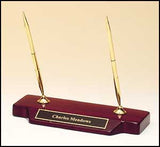 Double pen set on a rosewood stained piano finish base