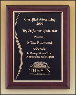 Rosewood plaque with wave accented plate