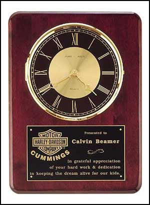 Rosewood Piano Finish vertical wall clock with black background