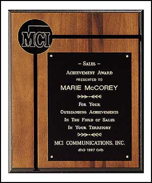 American walnut plaque with brass disc on corner