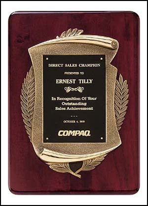 Rosewood plaque with antique bronze finished casting