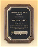 Walnut Stained plaque with sunburst design and notched corners