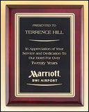Rosewood plaque with gold florentine border