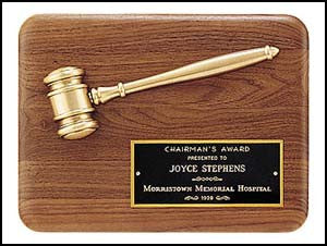 American walnut gravel plaque with antique bronze casting